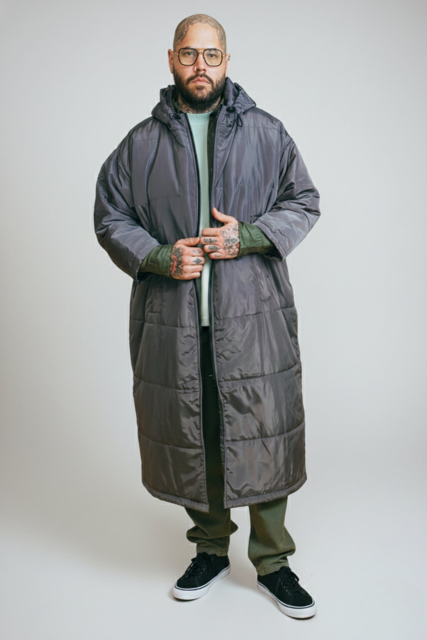 Mitchell wearing a Sittingsuit, shown as a fit example