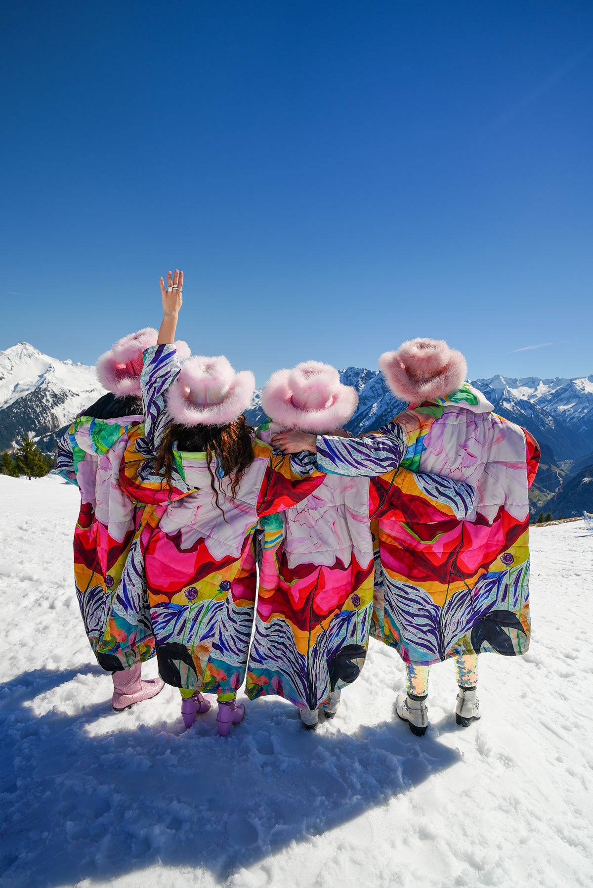 A group wearing Artist Edition Sittingsuits at Snowbombing Festival